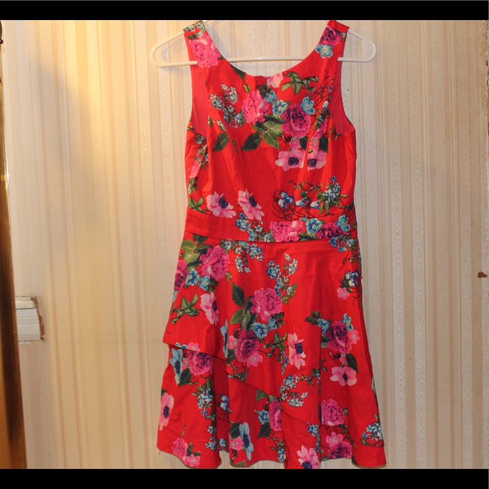 red dress with cute minimalistic flower design